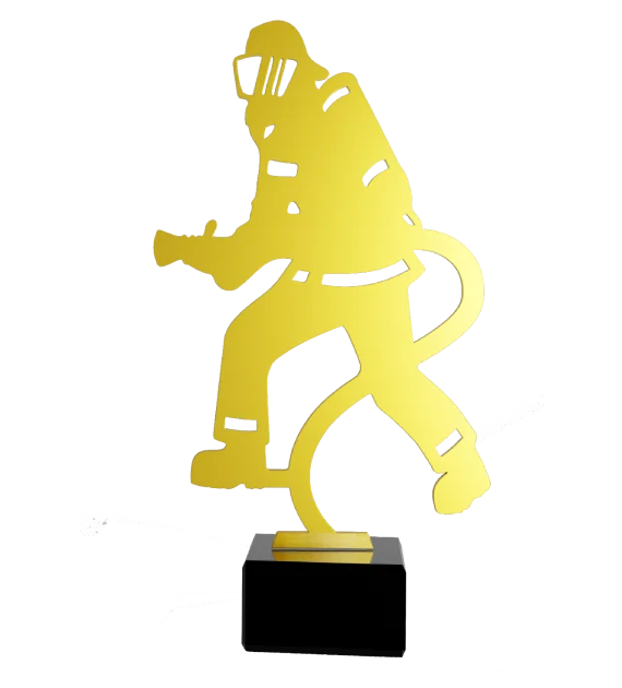 Statuetka Złoty Strażak wyciętego w kształt strażaka w metalu i umieszczona na marmurowej podstawie